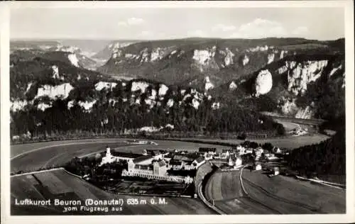 Ak Beuron an der Donau Württemberg, Luftkurort  Donautal, hügelige Landschaft, Gebäude, vom Flugz