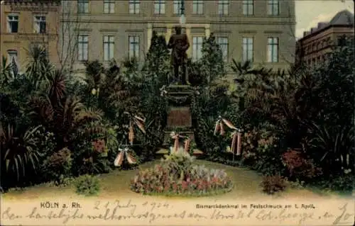 Ak Köln am Rhein, Bismarckdenkmal, festlich geschmückt, April, Pflanzen, Statue