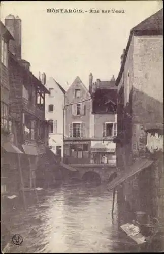 Ak Montargis Loiret, Schmaler Wasserweg, Häuser am Wasser, Café, Straßenansicht