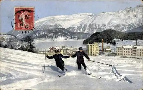 Ak Davos Kanton Graubünden, Zwei Skifahrer in einer verschneiten Berglandschaft.