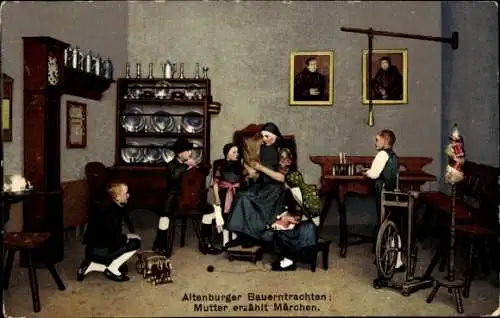 Ak Altenburg (S.A.) in Thüringen, Altenburger Bauerntrachten: Mutter erzählt Märchen.