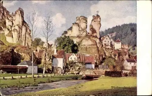 Künstler Ak Tüchersfeld Pottenstein Oberfranken, Häuser mit Felsen