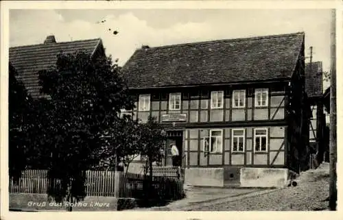 Ak Rotha Sangerhausen am Südharz, Ein Fachwerkhaus, Bäume, Gruß aus Rotha i. Harz