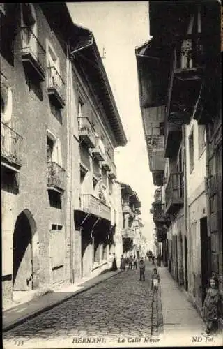 Ak Hernani Baskenland Spanien, Strasse mit Gebäuden, schmaler Weg, Balkone