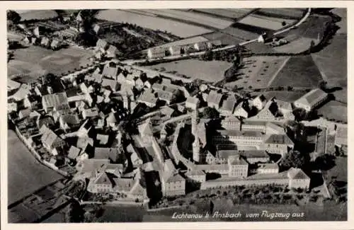 Ak Lichtenau in Mittelfranken, Luftaufnahme von Lichtenau,  Gebäude, ländliche Umgebung