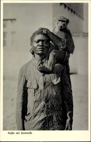 Ak Kaffer mit Hundsaffe, Afrikaner mit einem Affen auf der Schulter, Deutsch Südwestafrika