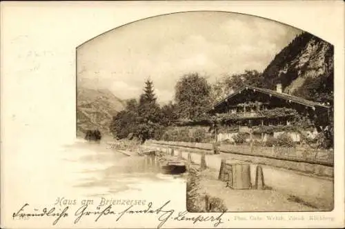 Ak Giessbach am Brienzersee Kanton Bern, Haus am  Landschaftsbild, freundliche Grüße