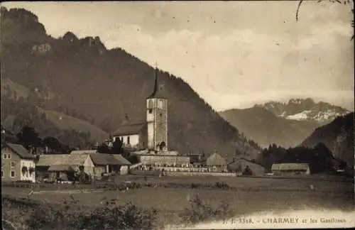 Ak Charmey Kanton Freiburg, Kirche und Gastlosen, Teilansicht