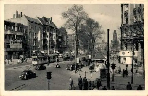 Ak Berlin Charlottenburg, Kurfürstendamm Ecke Uhlandstraße, U Bahneingang, Autos, Fußgänger