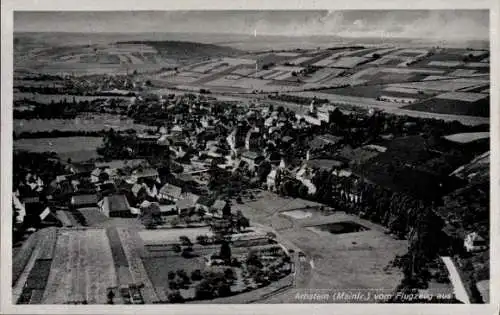 Ak Arnstein in Unterfranken, Luftaufnahme von Arnstein, Landschaft, Gebäude, Flugzeugsicht