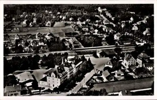 Ak Gauting in Oberbayern, Luftaufnahme von  viele Wohngebäude, Bäume, Straßen