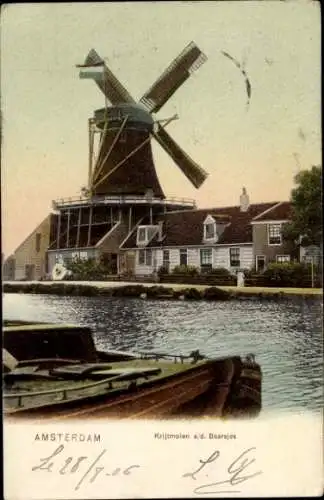 Ak Amsterdam Nordholland Niederlande, Windmühle, Wasser, Gebäude, Holzboot