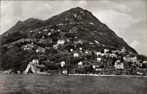 Ak Lugano Kanton Tessin Schweiz, Berglandschaft mit Monte Brè, Häuser am Hang, Wasser im Vordergr