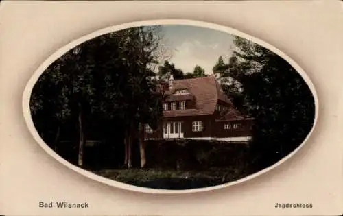 Ak Bad Wilsnack in der Prignitz, Jagdschloss, umgeben von Bäumen