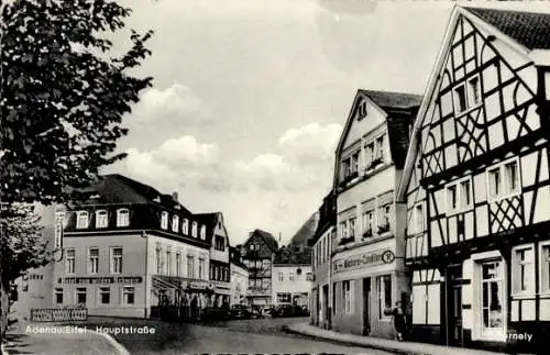 Ak Adenau in der Eifel, Hauptstraße, Fachwerkhäuser, Geschäfte, belebte Straße, 