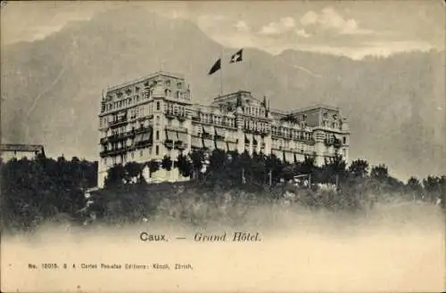 Ak Caux Montreux Kanton Waadt, Grand Hôtel, große Gebäude, Flagge, Berglandschaft