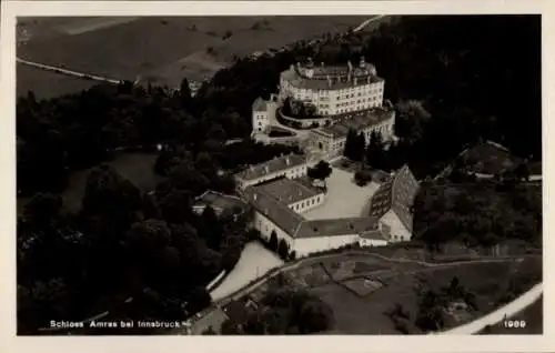 Ak Amras Innsbruck in Tirol, Fliegeraufnahme vom Schloss