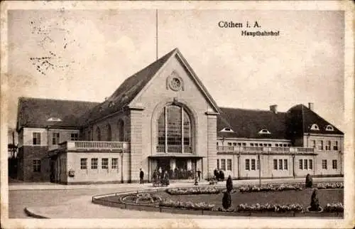 Ak Cöthen Köthen in Anhalt, Hauptbahnhof, Gebäude, Menschen, Landschaft, Blumenbeet