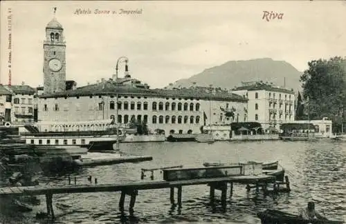 Ak Riva del Garda Trentino, Hotel Sonne u. Imperial, Uhrturm, Seeansicht, Berge