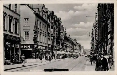 Ak Saarbrücken, Straßen mit Verkehr und Geschäften