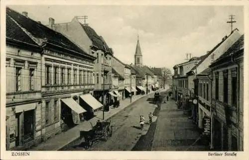 Ak Zossen in Brandenburg, Blick auf die Berliner Straße, alte Gebäude, Pferdewagen, Markisen