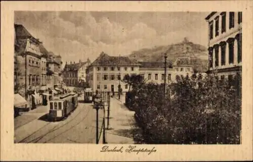 Ak Durlach Karlsruhe in Baden, Straßenansicht, Straßenbahn, alte Gebäude, Wolken, Durlach Hauptst