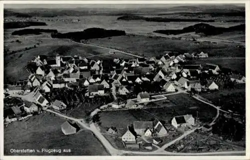 Ak Oberstetten Niederstetten in Baden Württemberg, Luftaufnahme von  viele Dächer, ländliche Umge