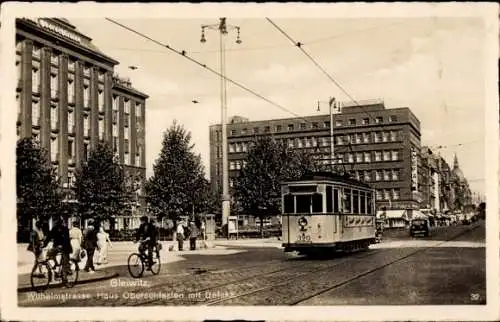 Ak Gliwice Gleiwitz Oberschlesien, Wilhelmstraße, Haus Oberschlesien, Defaka, Straßenbahn