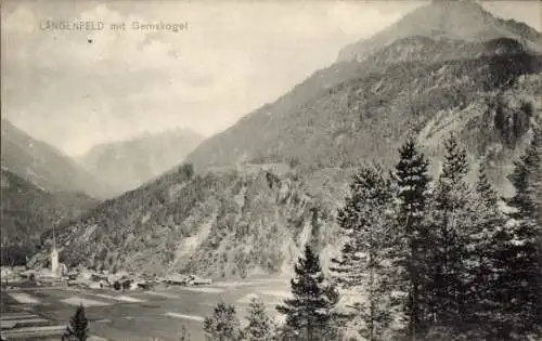 Ak Längenfeld Tirol Österreich , Längenfeld mit Gemskogel, Gebirgsmassiv, Kirche, Dorfansicht