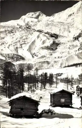 Ak Adelboden Kanton Bern Schweiz, Schneebedeckte Berge, zwei einfache Holzhütten, Kiefernwald