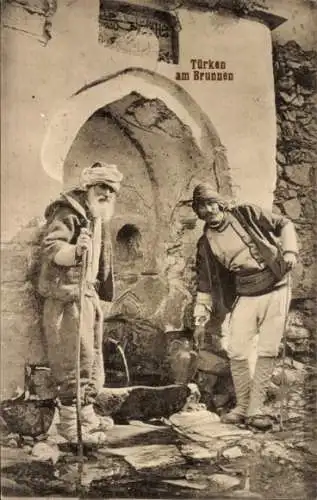 Ak Konstantinopel Istanbul Türkei, Türken am Brunnen, zwei Männer, traditionell gekleidet, his...