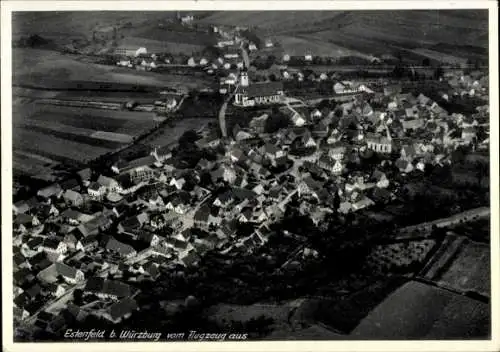 Ak Estenfeld in Unterfranken, Luftaufnahme, Estenfeld, Häuser, Kirche