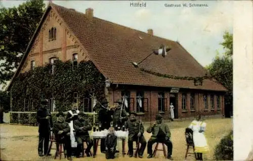 Ak Hittfeld Seevetal in Niedersachsen, Gasthaus W. Schmanns, Soldaten in Uniform, Tisch mit Geträ