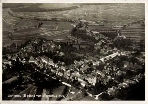 Ak Lichtenau in Baden, Luftbild,  Blick vom Flugzeug, ländliche Landschaft, viele Häuser