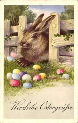 Ak Herzliche Ostergrüße, Osterhase schaut durch Zaun