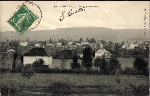 Ak Les Abrets Isère, Joli quartier, Landschaft mit Gebäuden, Bäume, Poststempel