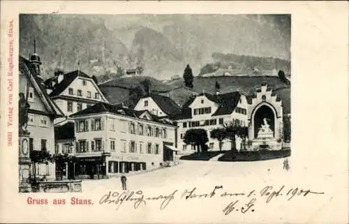 Ak Stans Kanton Nidwalden, Historische Gebäude, Brunnen, Berge im Hintergrund, Gruss aus Stans