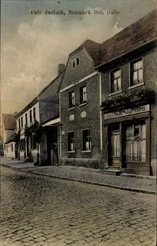 Ak Neumark in Sachsen, Café Jurisch, Straße mit Gebäuden,  Architektur