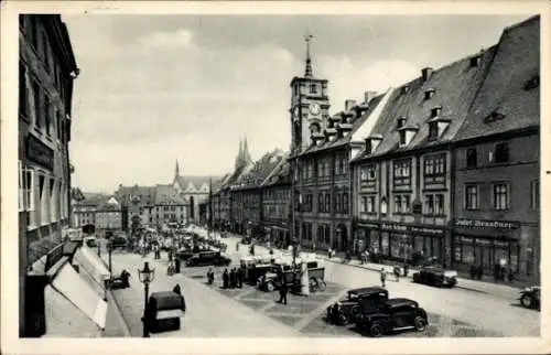 Ak Cheb Eger Reg. Karlsbad, Marktplatz, parkende Autos, Feinkost Josef Brandner