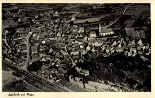 Ak Retzbach Zellingen am Main Unterfranken, Luftaufnahme des Dorfes Retzbach, viele Gebäude, Kirc