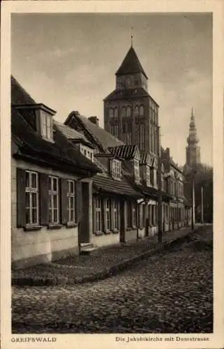 Ak Greifswald in Mecklenburg Vorpommern, Die Jakobikirche mit Domstraße