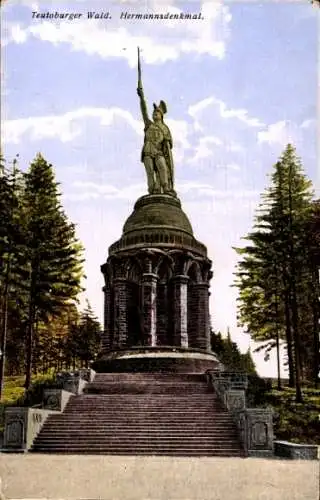 Ak Detmold am Teutoburger Wald, Hermannsdenkmal, Statue, Baumgruppe, geschichtsträchtiger Ort