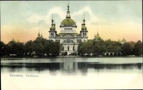Ak Hansestadt Bremen, Historisches Parkhaus, Gebäude mit Türmen, Wasser spiegeln, Bäume