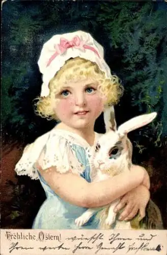Künstler Ak Frohe Ostern, Mädchen hält einen Hasen im Arm