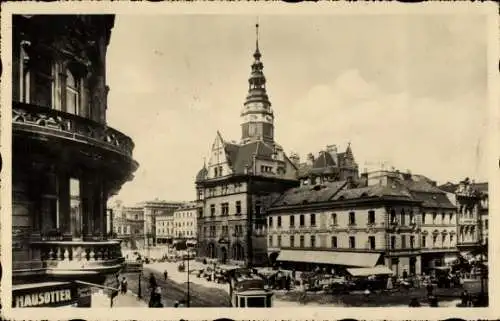 Ak Opava Troppau Region Mährisch Schlesien, Stadtansicht, Hausotter, Uhrturm, historische Arch...