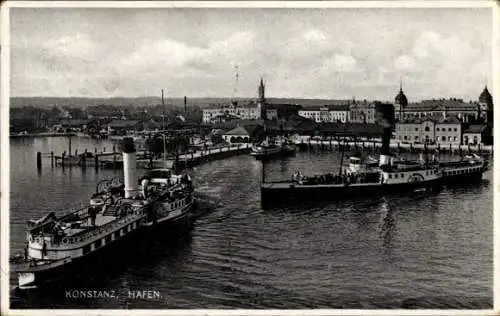 Ak Konstanz am Bodensee, Hafenansicht, Schiffe im Hafen, Stadtansicht im Hintergrund