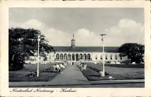 Ak Nordseebad Norderney Ostfriesland, Kurhaus, Nordseebad  Park mit Blumenrabatten