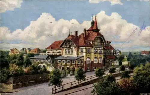 Ak Jößnitz im Vogtland, Bahnhofshotel, malerisches Gebäude, umgeben von Bäumen, freundliche Atmos