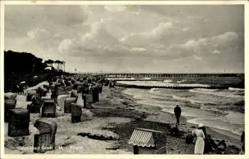 Ak Ostseebad Graal Müritz, Strandansicht mit Strandkörben, Wellen, cloudy sky, Promenade