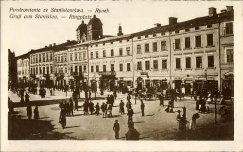 Ak Stanisławów Stanislau Ukraine, Ringplatz, Menschen auf Straße,  Gebäude